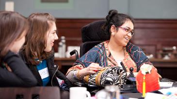 Group of young experts by experience talking